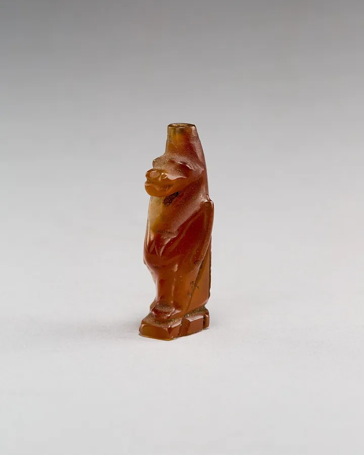A carnelian amulet of Taweret: The hippopotamus goddess Taweret, carved in carnelian, 3 cm high. Egyptian, New Kingdom, About 1550 to 1300 BC.