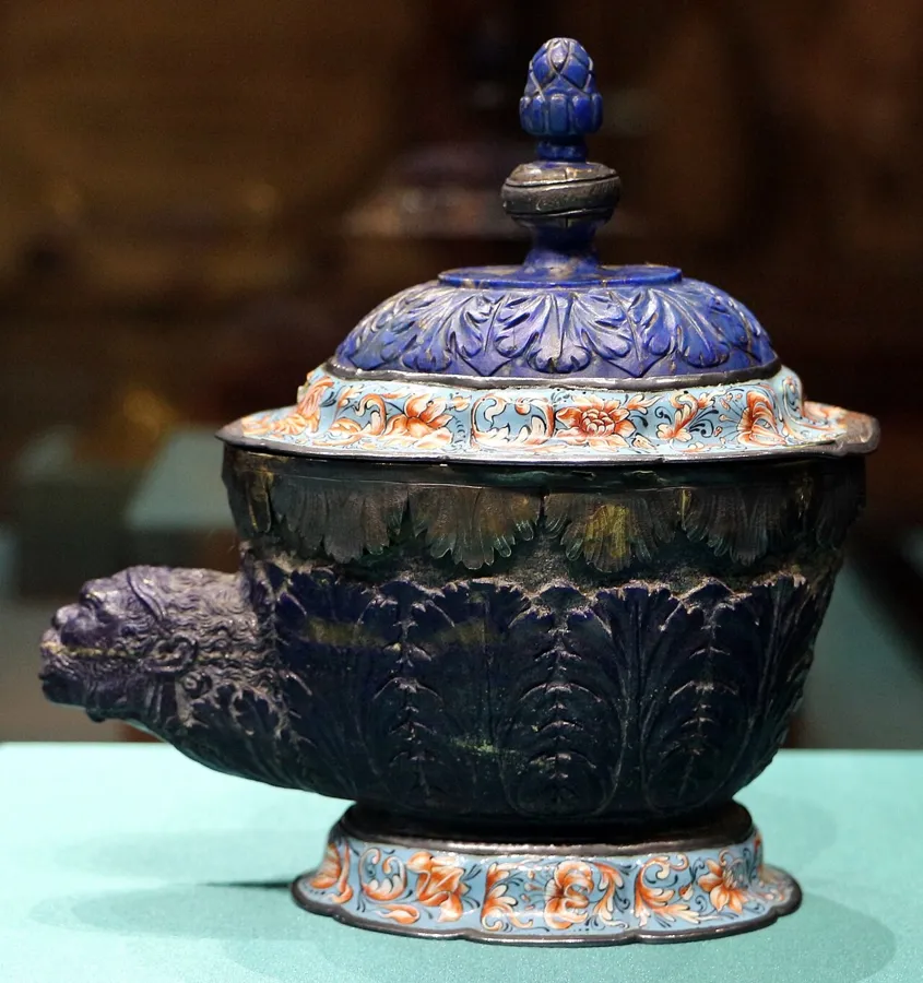 A covered lapis vase from Modena: A lidded vase of lapis lazuli with silver and enamel mounts, attributed to Gasparo Miseroni, from the collection of the Este dukes.
