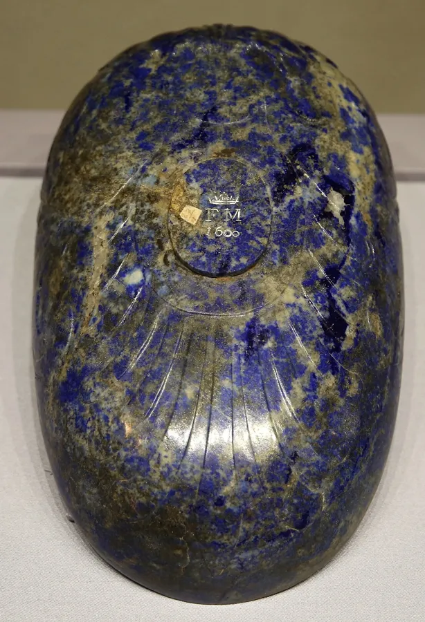A Florentine lapis niche cup: An oval lapis lazuli cup carved in the Medici grand-ducal workshops (the Galleria dei Lavori) in Florence around 1600.