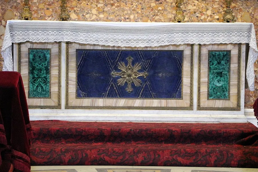 A malachite and lapis altar in the Lateran: The altar of the Torlonia Chapel in Saint John Lateran, designed by Quintiliano Raimondi, faced with green malachite and blue lapis lazuli.