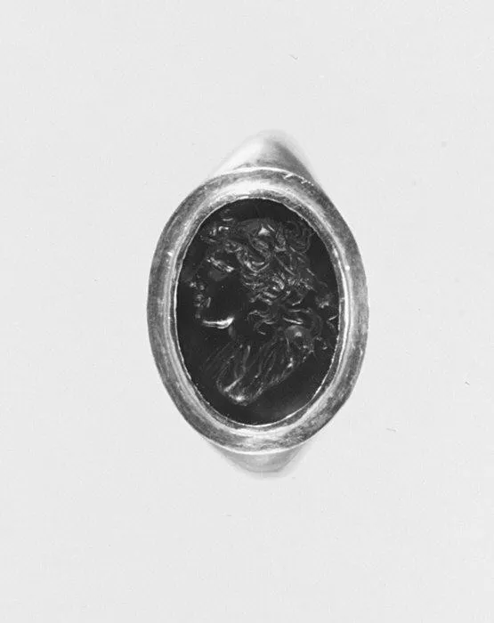 Alexander the Great on a carnelian ring: A gold ring set with a carnelian intaglio head of Alexander the Great. Greek, Hellenistic, 3rd century BC.