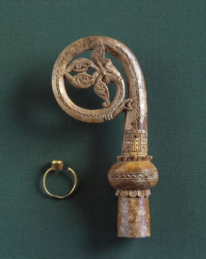 A Norse bishop’s ring from Greenland: A gold episcopal ring and the head of a walrus-ivory crozier, found together in a bishop’s grave at Garðar (Igaliku), Greenland. The skeleton dates to about 1223 to 1290, probably Bishop Óláfr, who held the see from 1246 to 1280.
