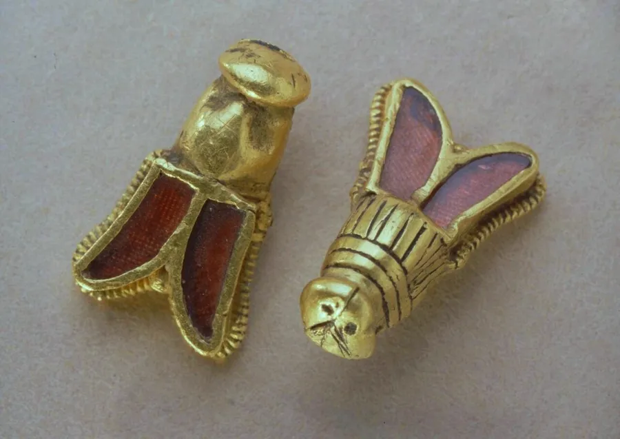 Childeric’s golden bees: Small gold bees with wings inlaid with garnets, from the tomb of the Frankish king Childeric I, found at Tournai in 1653.