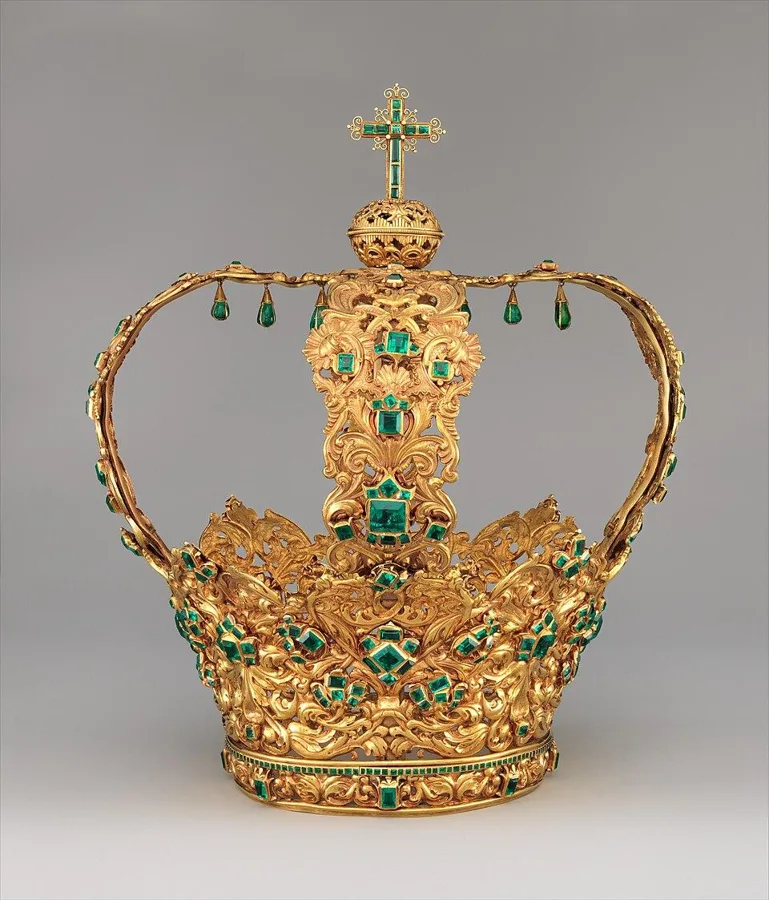 The Crown of the Andes: A gold crown set with hundreds of Colombian emeralds, made in Popayan, Colombia, from about 1660, with arches added about 1770.