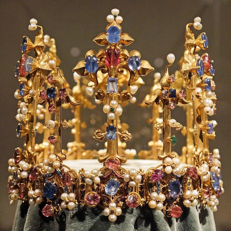 The Crown of Princess Blanche: A gold crown set with sapphires, rubies, emeralds, diamonds and pearls, made around 1370 to 1380.