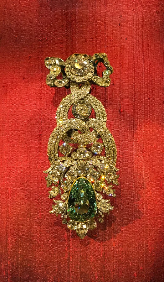 The Dresden Green Diamond: About 41 carats, the largest natural green diamond known, set in an 18th-century hat ornament.