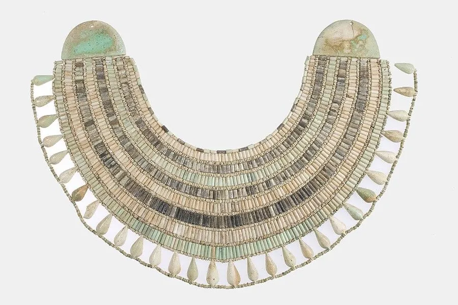 An Egyptian broad collar: A wide collar of many rows of blue-green faience beads, ancient Egypt.