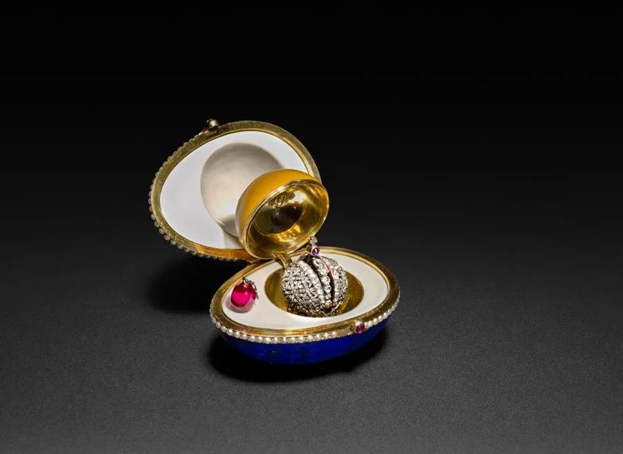 Fabergé’s lapis lazuli egg: An Easter egg carved from lapis lazuli, opening to a gold yolk with a tiny crown and a ruby inside, by Fabergé.