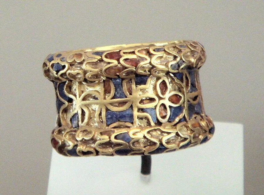 A Sumerian ring of gold, carnelian and lapis: A gold ring inlaid with carnelian and lapis lazuli, from ancient Girsu (Tello), Iraq, mid 3rd millennium BC.