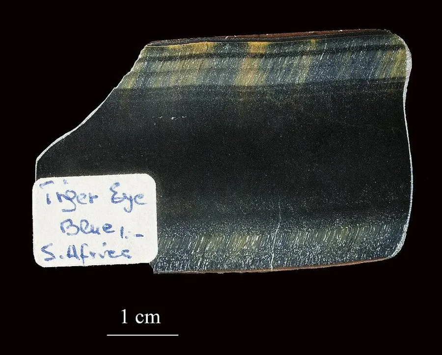 Hawk’s eye, the blue form: A polished slab of blue-grey hawk’s eye from South Africa, labelled in the collection as blue tiger eye.