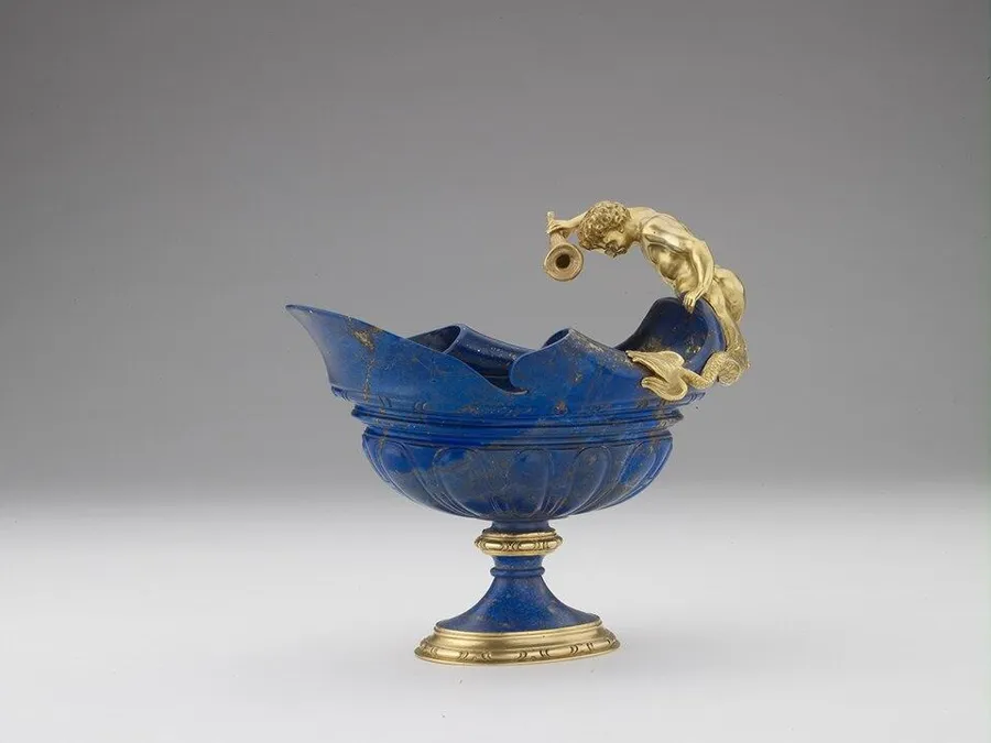 A lapis ewer from Prague: A ewer carved from a single block of lapis lazuli and wrapped in gold, probably made in Prague around 1600, the mounts perhaps by Paulus van Vianen.