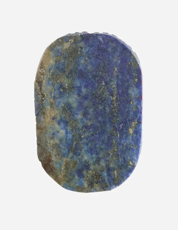 A lapis heart scarab: A large scarab placed over the heart of a mummy, ancient Egypt.
