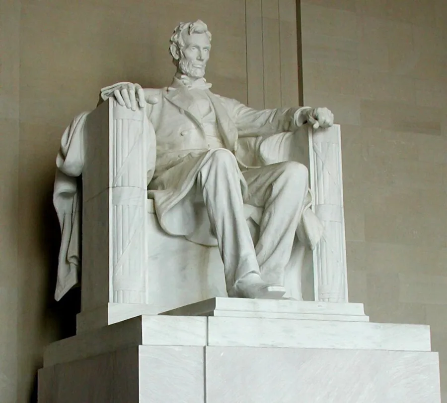 The Lincoln Memorial statue: 28 blocks of white Georgia marble, 170 tons, the seated figure 19 ft high; designed by Daniel Chester French and carved by the Piccirilli Brothers, 1920.