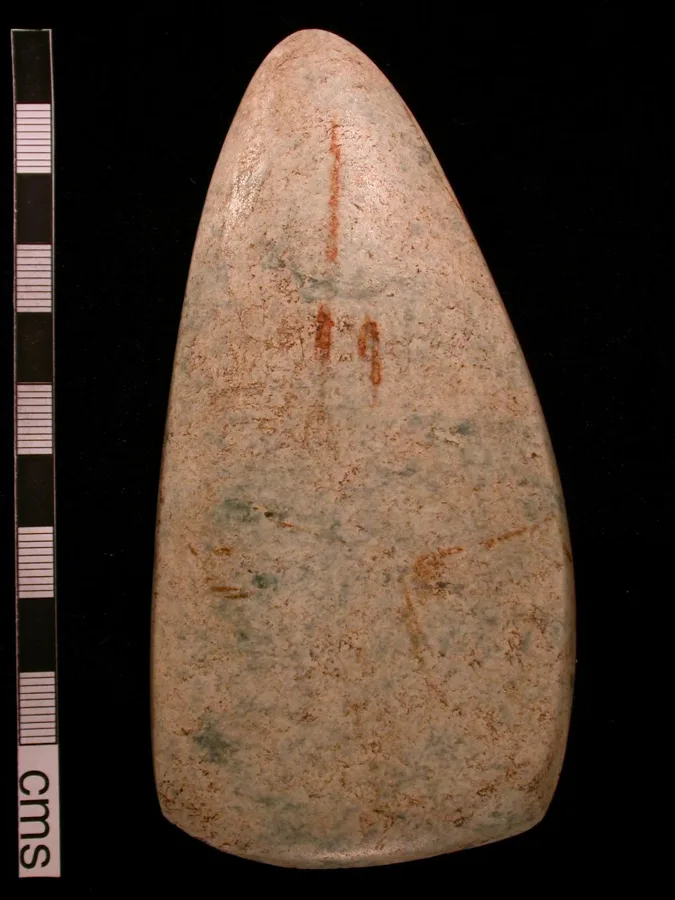 A Neolithic jadeite axehead: A polished jadeite axe found in Cornwall, England, made about 6,000 years ago.