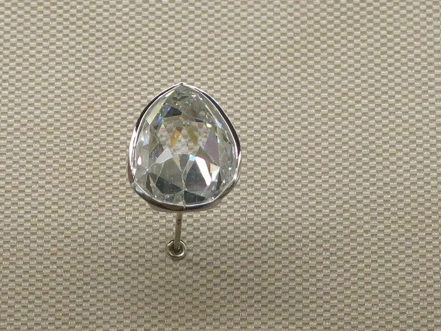The Sancy Diamond: About 55 carats, a pale yellow pear-shaped diamond, probably from India.