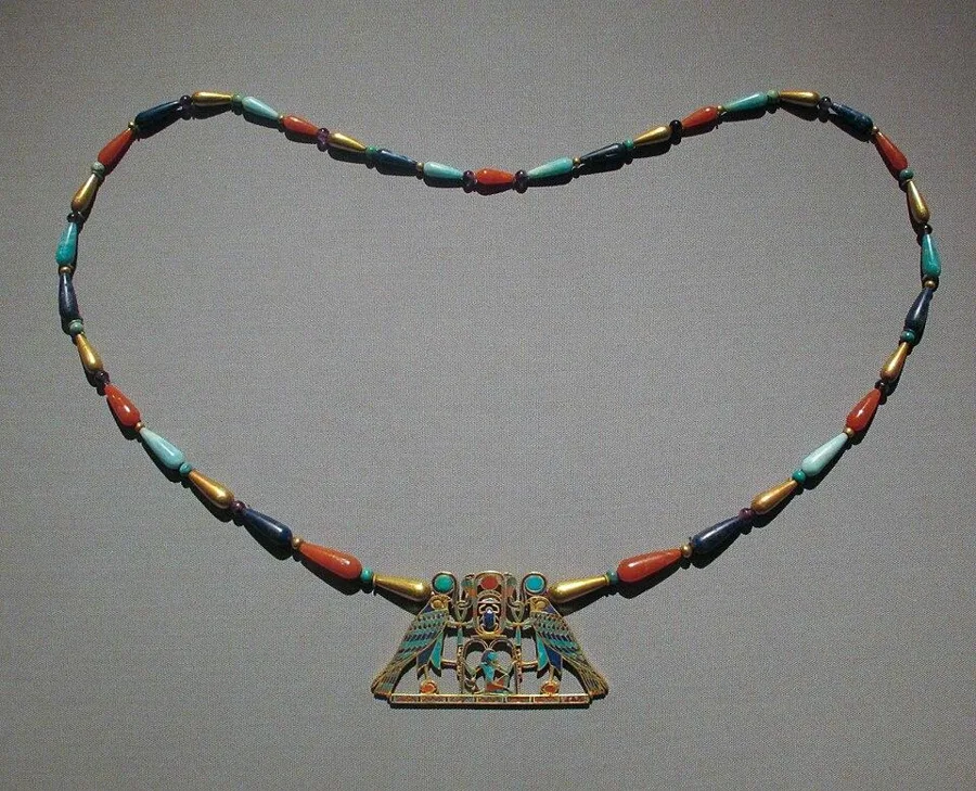 The pectoral of Princess Sithathoryunet: Gold inlaid with lapis lazuli, carnelian, turquoise and garnet, from about 1880 BCE.