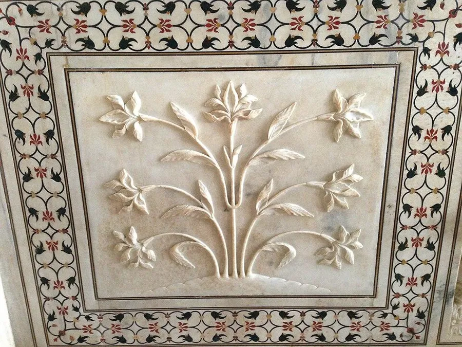 The stone flowers of the Taj Mahal: White marble inlaid with cut stones such as jasper, jade, lapis and carnelian, a technique called pietra dura, 17th century.