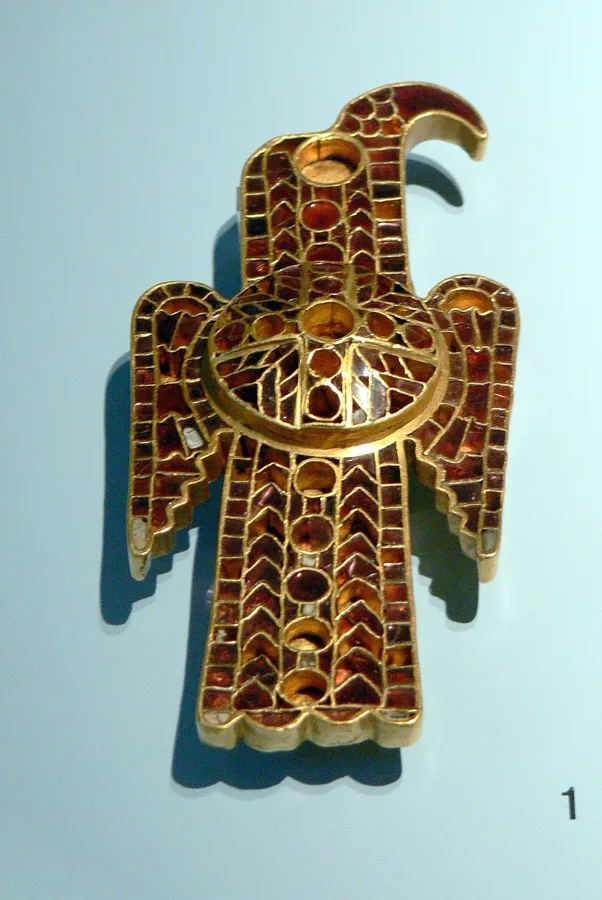 The Domagnano eagle brooch: An eagle-shaped gold brooch inlaid with garnets in cloisonné, from the Domagnano Treasure found in San Marino.