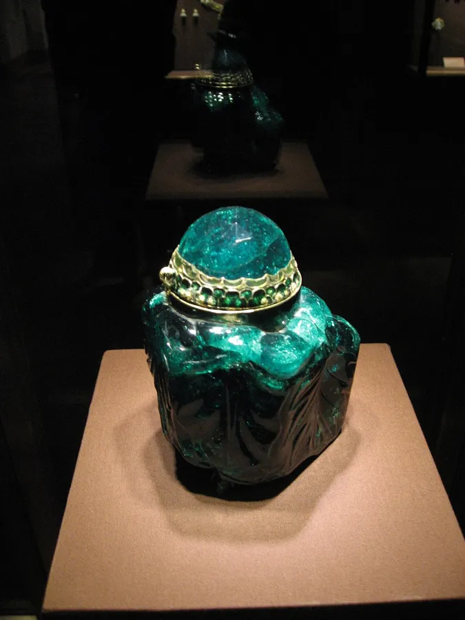 The Emerald Unguentarium: A small vessel hollowed out of a single 2,680-carat Colombian emerald crystal by Dionysio Miseroni in Prague in 1641, with an enamelled gold lid.