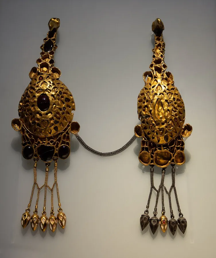 The Pietroasele eagle brooches: Gold eagle-shaped brooches set with garnets and other stones from the Pietroasele Treasure, a Gothic hoard found by quarrymen in Romania in 1837.