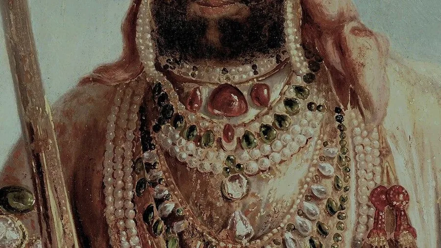 The Timur Ruby (a spinel): A spinel of about 352 carats, engraved with the names of earlier owners, here worn by Maharaja Sher Singh of the Sikh Empire in a painting by August Schoefft.