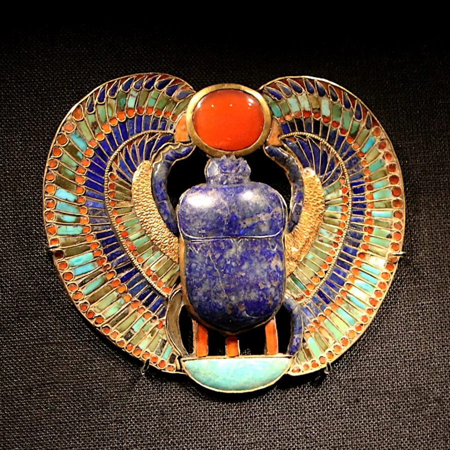 Tutankhamun's scarab pectoral: Gold, inlaid with lapis lazuli, carnelian and other coloured stones and glass, about 3,300 years old.