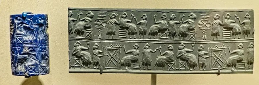 A lapis lazuli cylinder seal: A small carved lapis cylinder, rolled across wet clay to print a signature scene, about 2500 BCE.
