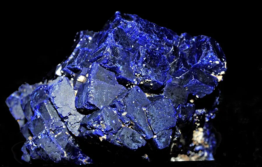 Crystallised azurite from China: deep blue crystals that grew where water broke down copper ore near the surface.