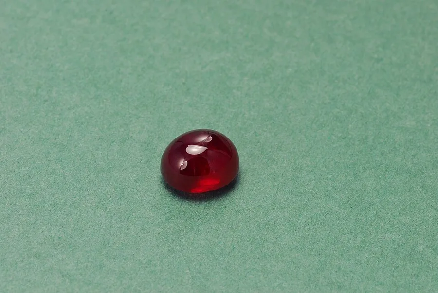 A glass-filled ruby: lead glass fills the cracks so a cloudy, broken stone looks clean.