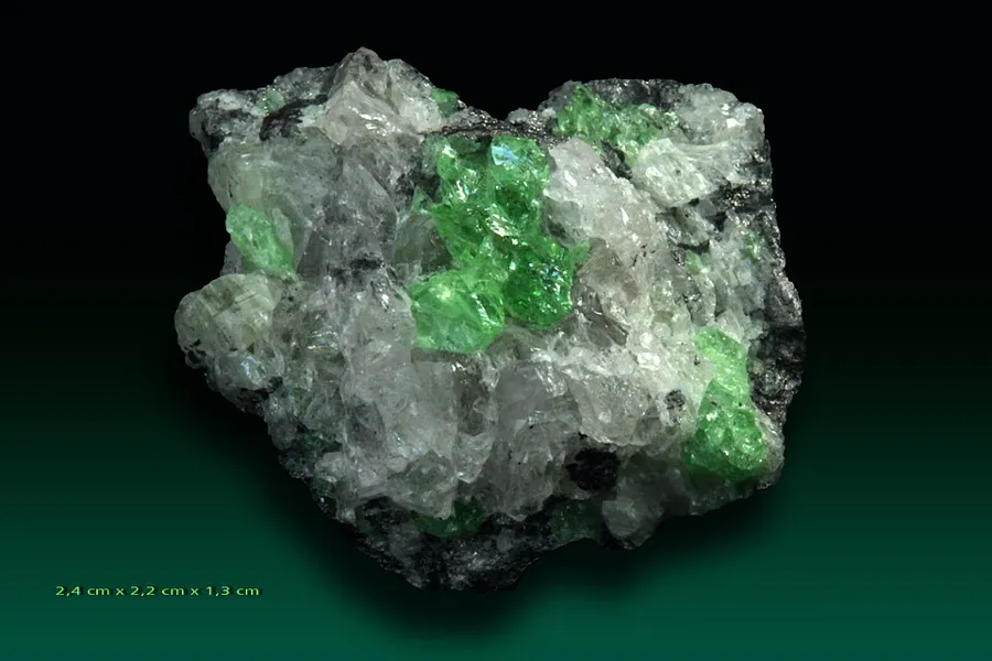 Green tsavorite garnet still in its host rock, Merelani Hills, Tanzania.