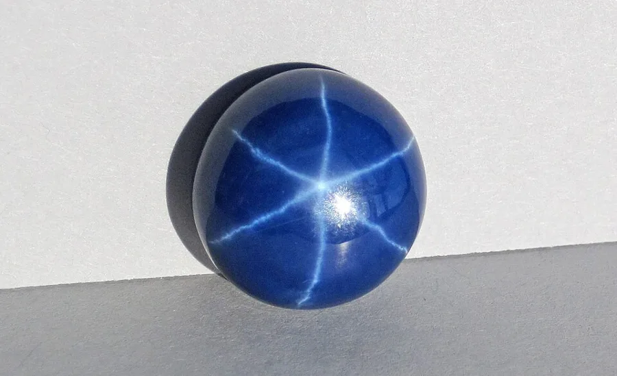 Pictured: an ordinary lab star sapphire, so you can see the star. Not the record stone: GIA’s article has photos of the 4,759 ct ruby.