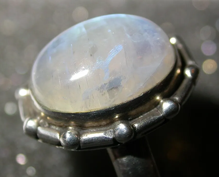 For comparison: a ring set with true moonstone, an orthoclase feldspar. Rainbow moonstone is a different mineral, labradorite.