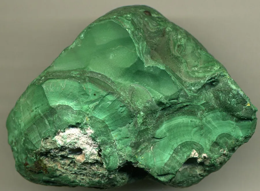 A malachite mass from Katanga, DR Congo, the world's main source, showing the green bands inside.