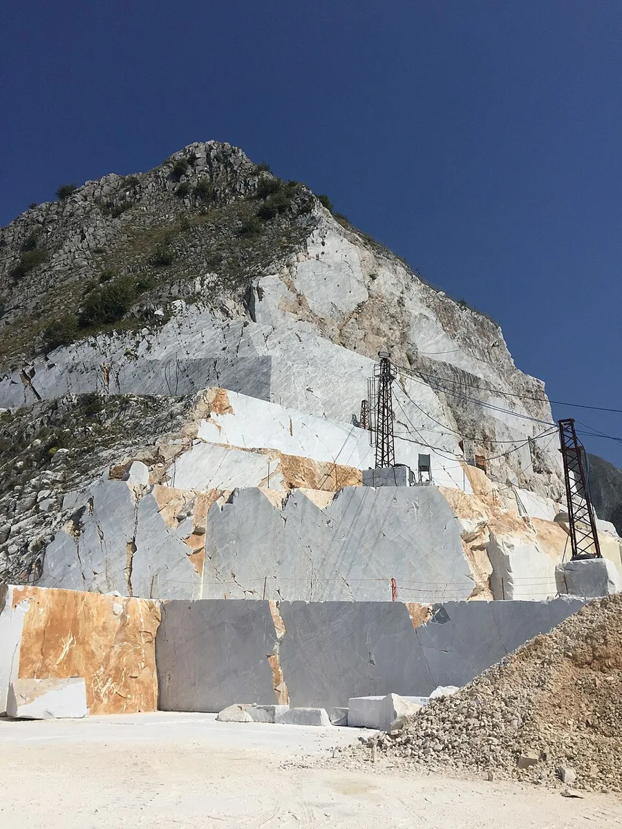 A working quarry face at Carrara in the Apuan Alps of Tuscany, quarried since Roman times.