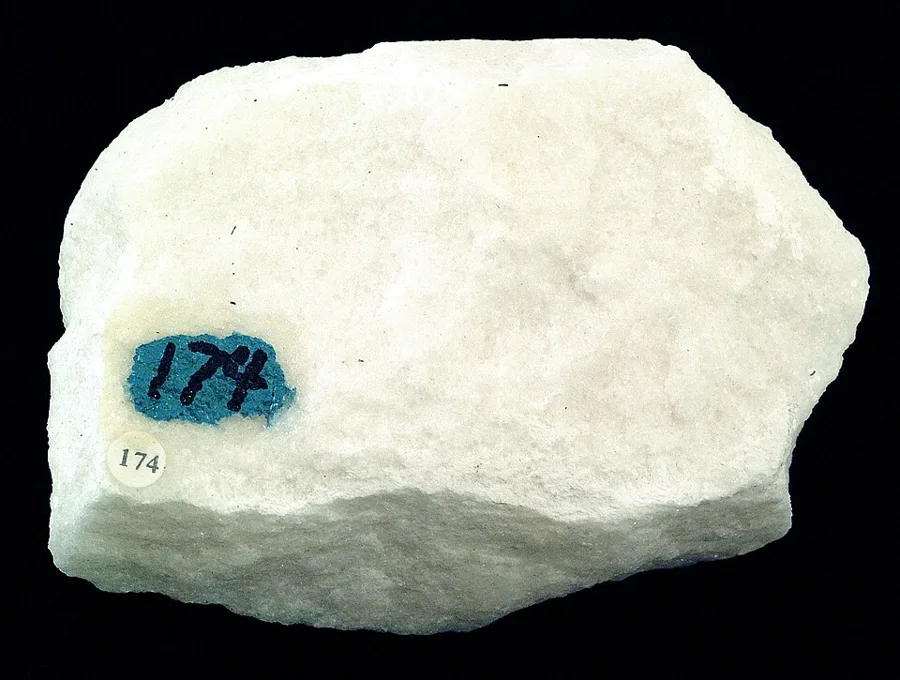 A sample of white marble: the sugary sparkle is countless interlocking calcite crystals.