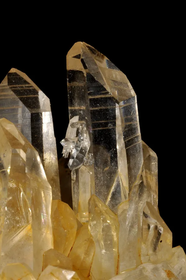 Quartz crystals grown on quartz, from Brazil: six-sided prisms ending in points.