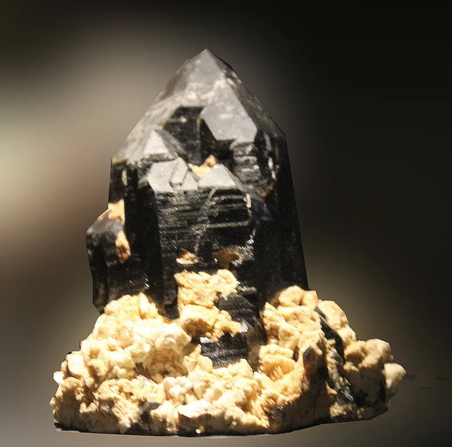 Morion, black smoky quartz, on potassium feldspar. Terra Mineralia collection, Freiberg, Germany.