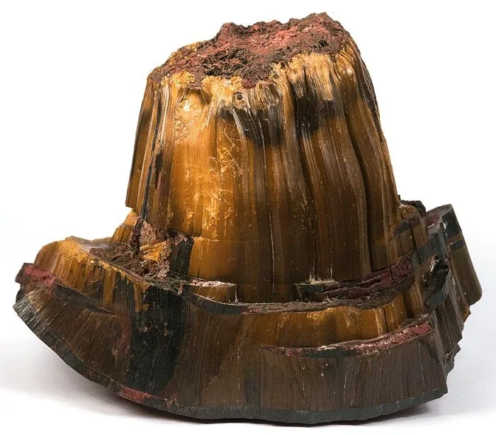 A tiger's eye specimen showing its fibrous structure: the stone is quartz grown through a mass of mineral fibres.