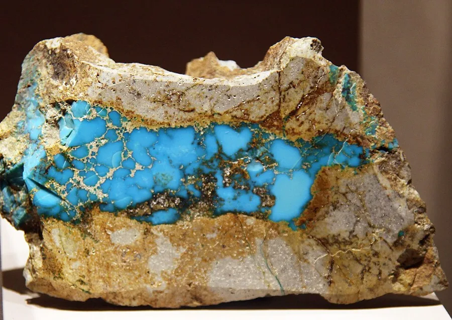 A vein of turquoise in its host rock from the Cerrillos Hills, New Mexico, mined by Ancestral Puebloans. Smithsonian collection.