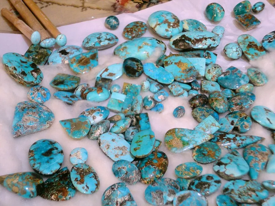 Turquoise cabochons cut in the mining village near Nishapur, Iran, the source of classic Persian turquoise.
