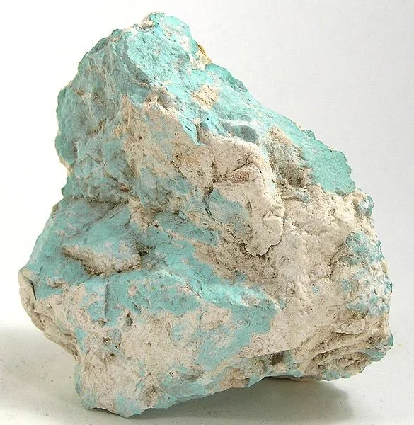 A raw turquoise nugget: chalky and porous on the outside, which is why most turquoise is stabilised before cutting.