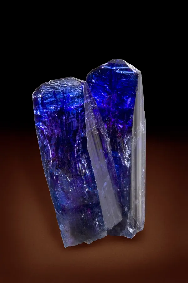 A sharp, glassy tanzanite crystal, 9 cm tall, from the Merelani Hills, Tanzania, the only place tanzanite is mined.